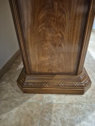 Mesa de comedor ovalada de madera y cristal