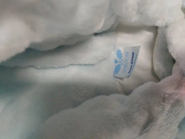 Chaqueta bebé azul suave y abrigada