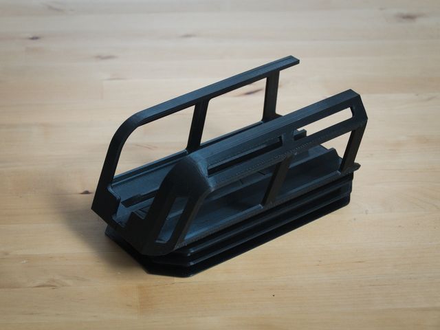 Supporto a parete per caricabatterie Bosch eBike con raccogli-cavo