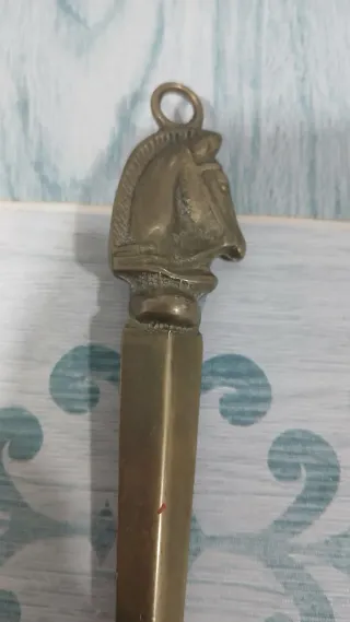 Antico cavatappi in ottone con testa di cavallo