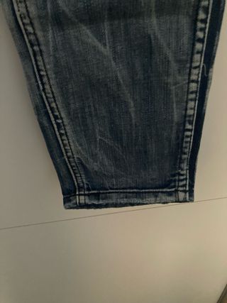 Pantalón vaquero vintage desgastado