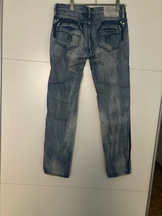 Pantalón vaquero vintage desgastado