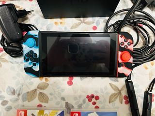 Nintendo Switch Negra y Multicolor como nuevas
