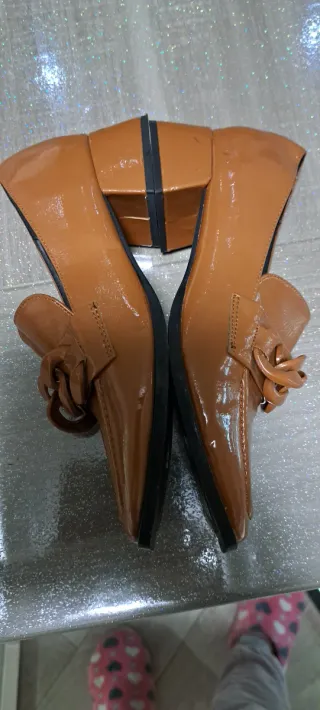 Mocassini Primadonna marroni con catena