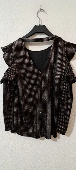 Blusa Sfera negra y dorada con volantes