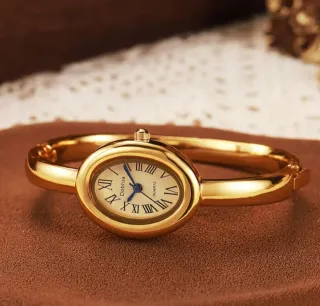 Reloj Dobroa Cuarzo Dorado Ovalado.