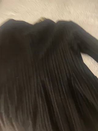 Americana bordada negra y dorada