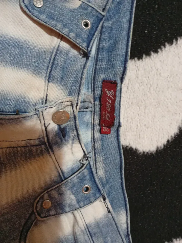 Pantalón vaquero rayas azul y blanco