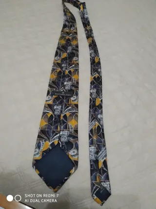 Cravatta Cinosciu fantasia blu e gialla