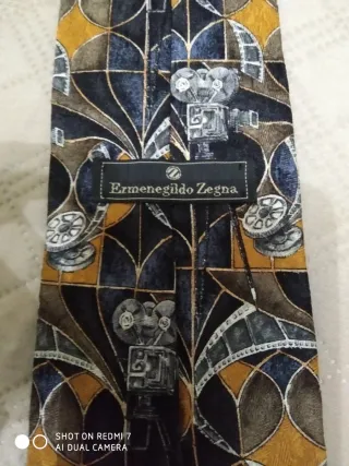 Cravatta Cinosciu fantasia blu e gialla