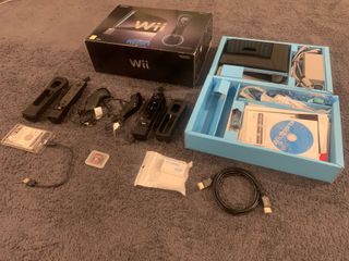 Nintendo Wii + 100 juegos y mandos.