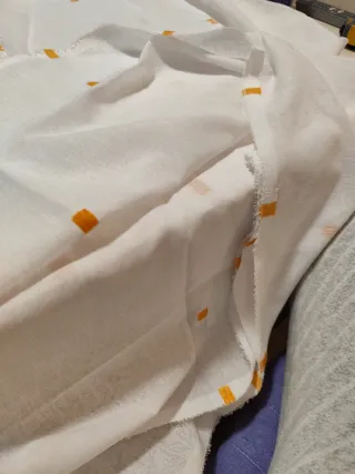 Retales de  tela cortina naranja y blanco