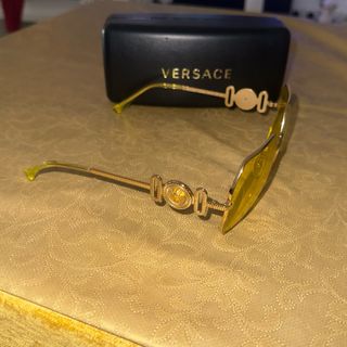 Occhiali da sole Versace dorati e gialli