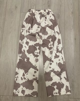 Pantalones estampado vaca