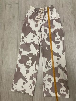 Pantalones estampado vaca