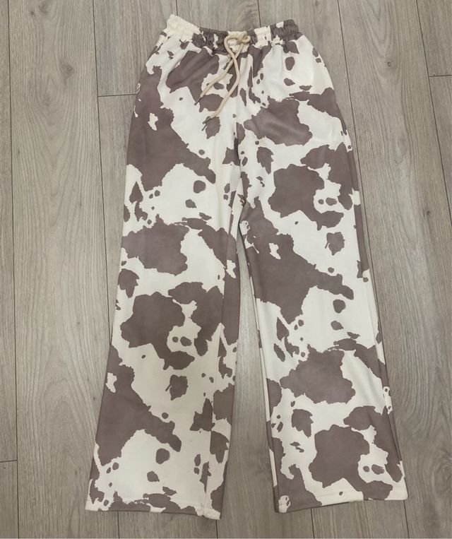 Pantalones estampado vaca