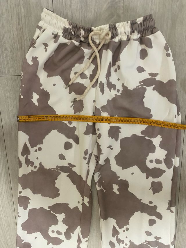 Pantalones estampado vaca
