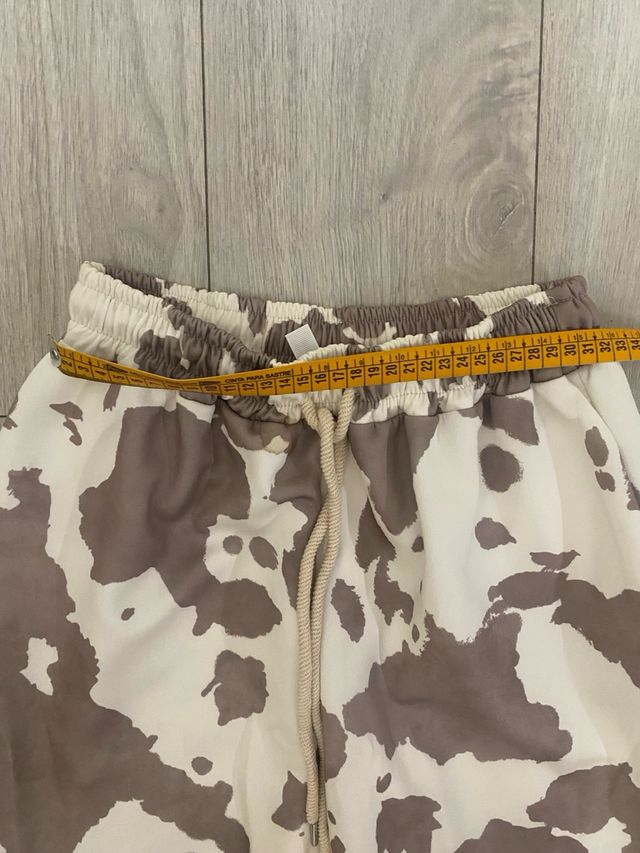 Pantalones estampado vaca