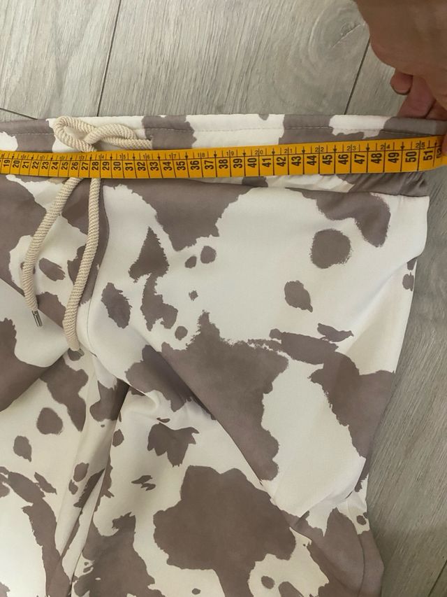 Pantalones estampado vaca