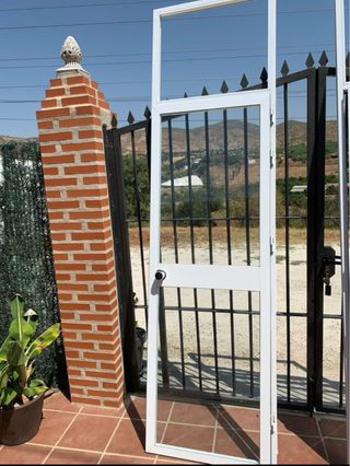 Puerta de aluminio con cristal