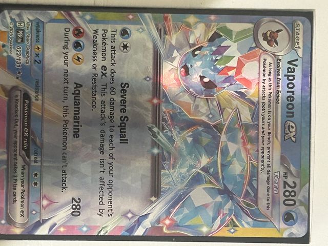 Carta Pokémon Vaporeon EX + funda