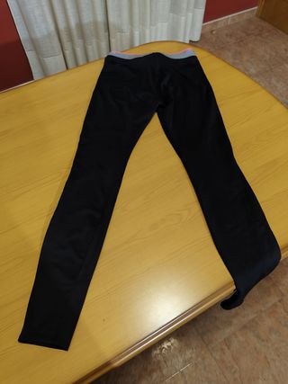 Leggings Domyos negros con detalles rosa