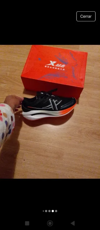 Zapatillas Xtep Negras y Naranjas