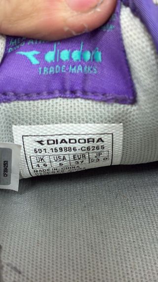 Diadora donna viola e verde acqua difetto in foto