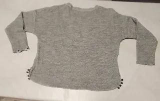 Jersey gris con pompones