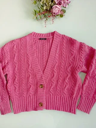 Chaqueta de punto rosa trenzado