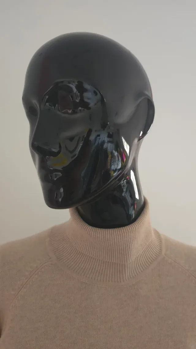 Jersey de punto beige de cuello vuelto