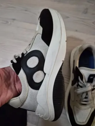 Zapatillas Purificación Garcia blancas y negras