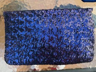 Bolso de lentejuelas morado y plateado