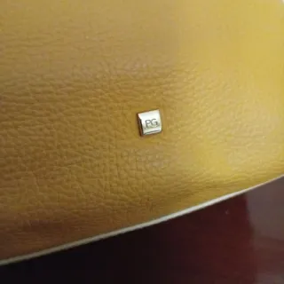 Bolso Piel Mostaza Purificación García con bandole