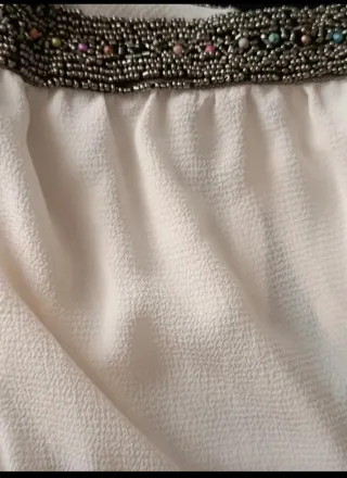 Mono fluido sin mangas beige