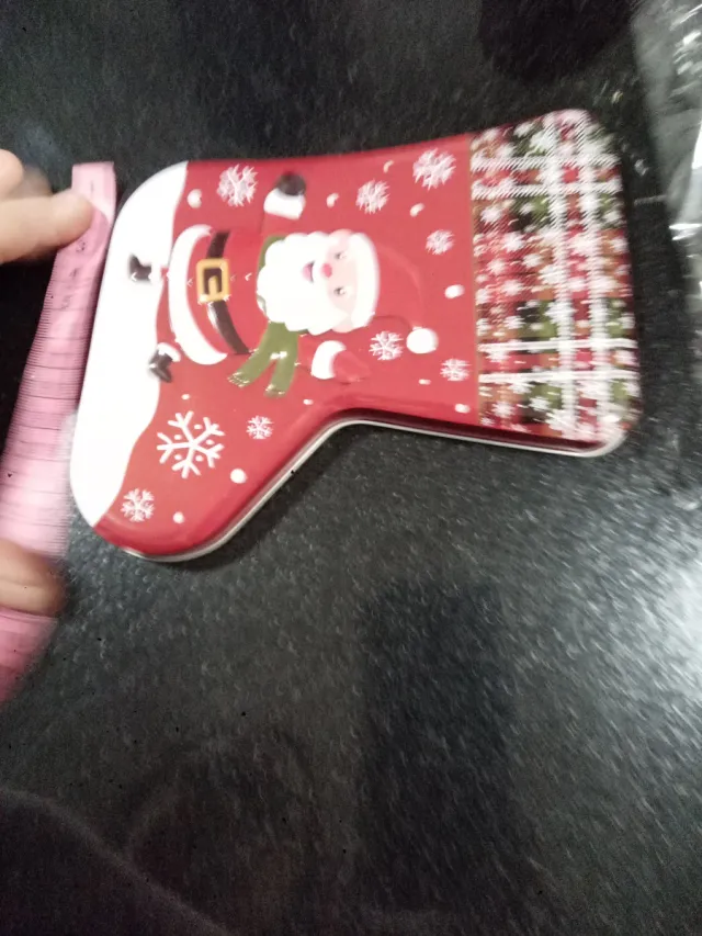 Scatola di latta natalizia con Babbo Natale