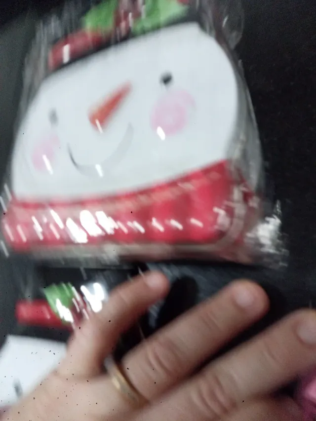 Scatola di latta a forma di pupazzo di neve