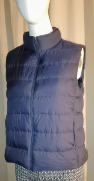 Piumino smanicato blu