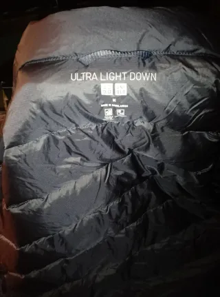 Piumino smanicato blu