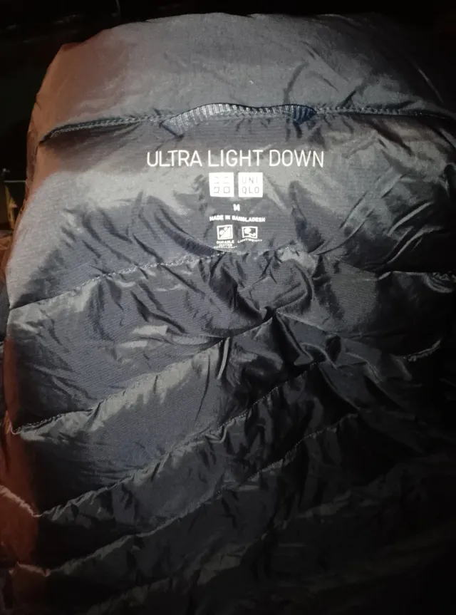 Piumino smanicato blu