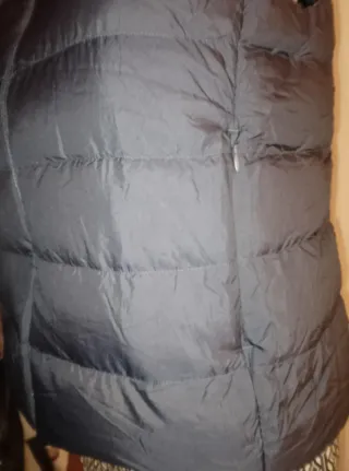 Piumino smanicato blu