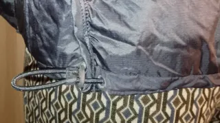 Piumino smanicato blu