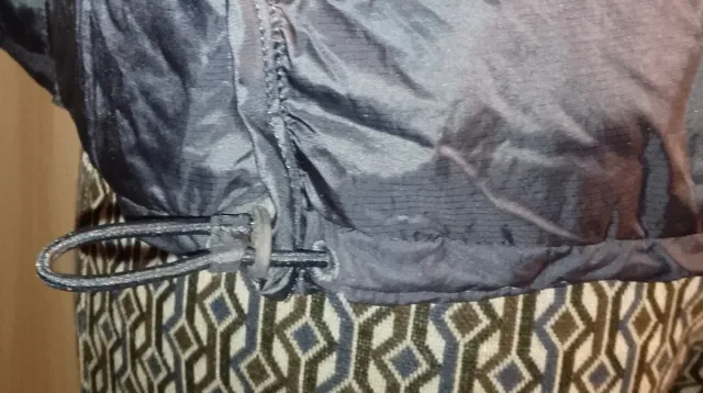 Piumino smanicato blu