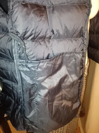 Piumino smanicato blu