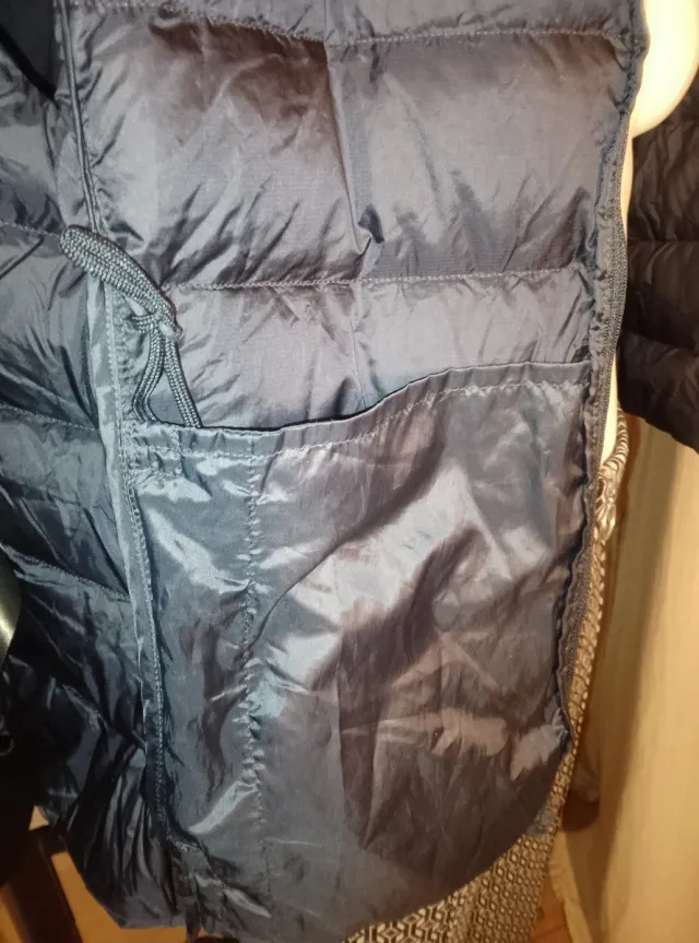 Piumino smanicato blu