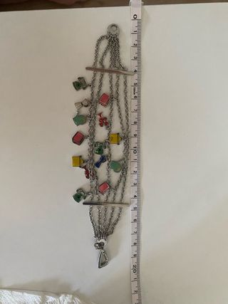 Pulsera dijes colgando Victorio Lucchino