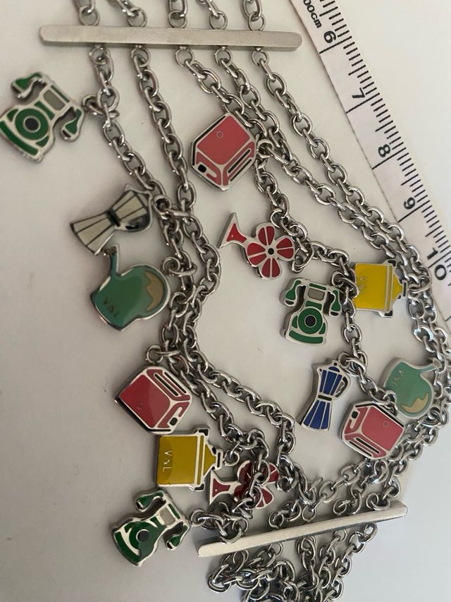 Pulsera dijes colgando Victorio  Lucchino