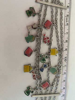 Pulsera dijes colgando Victorio Lucchino