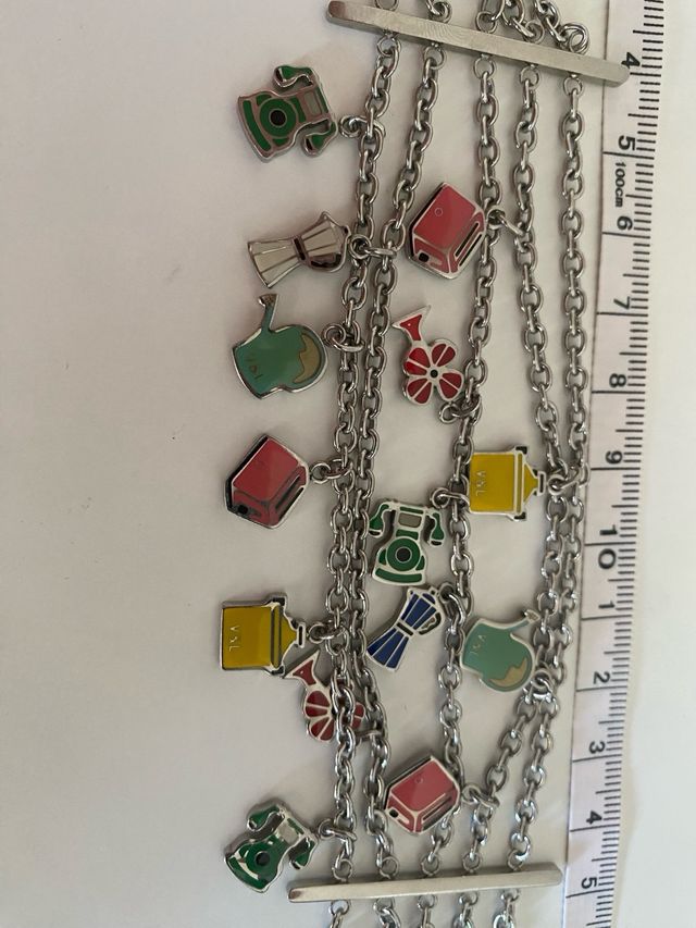 Pulsera dijes colgando Victorio  Lucchino