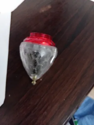 Trompo de plástico y metal